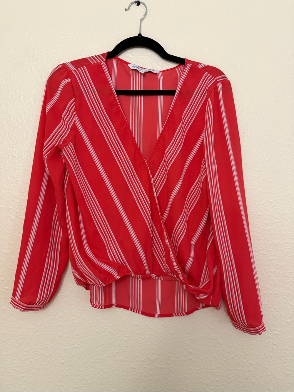 cupcakes & cashmere Stitch Fix Coral and White Striped Wrap Blouse